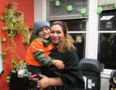 Rosa, a founding member of El Cafesito and her son.